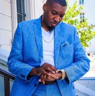 Black American Wearing Blue Suit